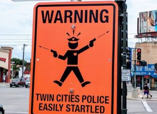 "Police easily startled" signs posted in St. Paul, Minneapolis